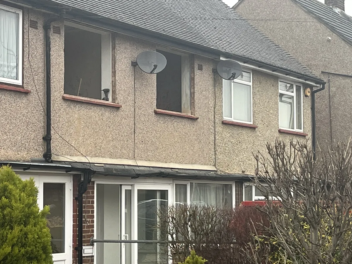 Terrace in Hornchurch with original pebbledash on the upper floor before work