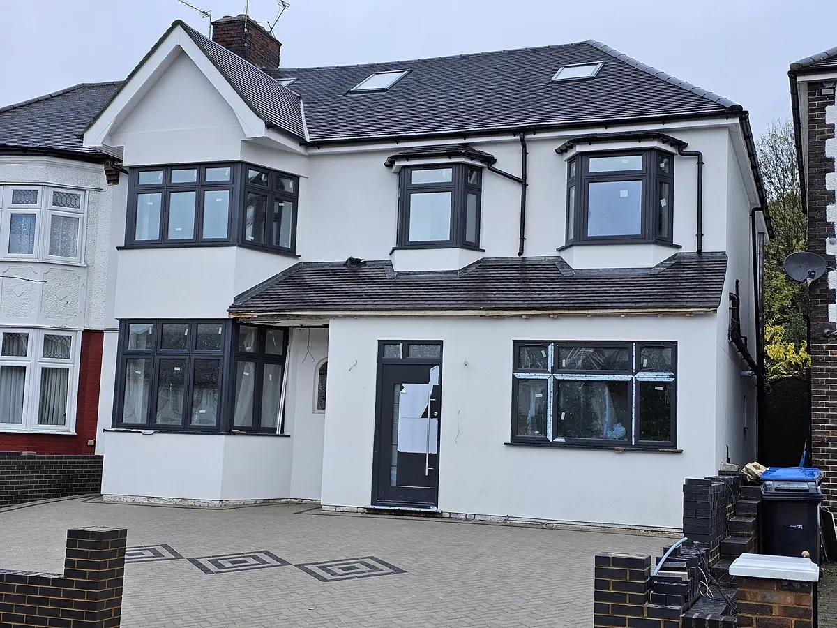 The same Palmers Green period semi finished in a white coloured silicone render