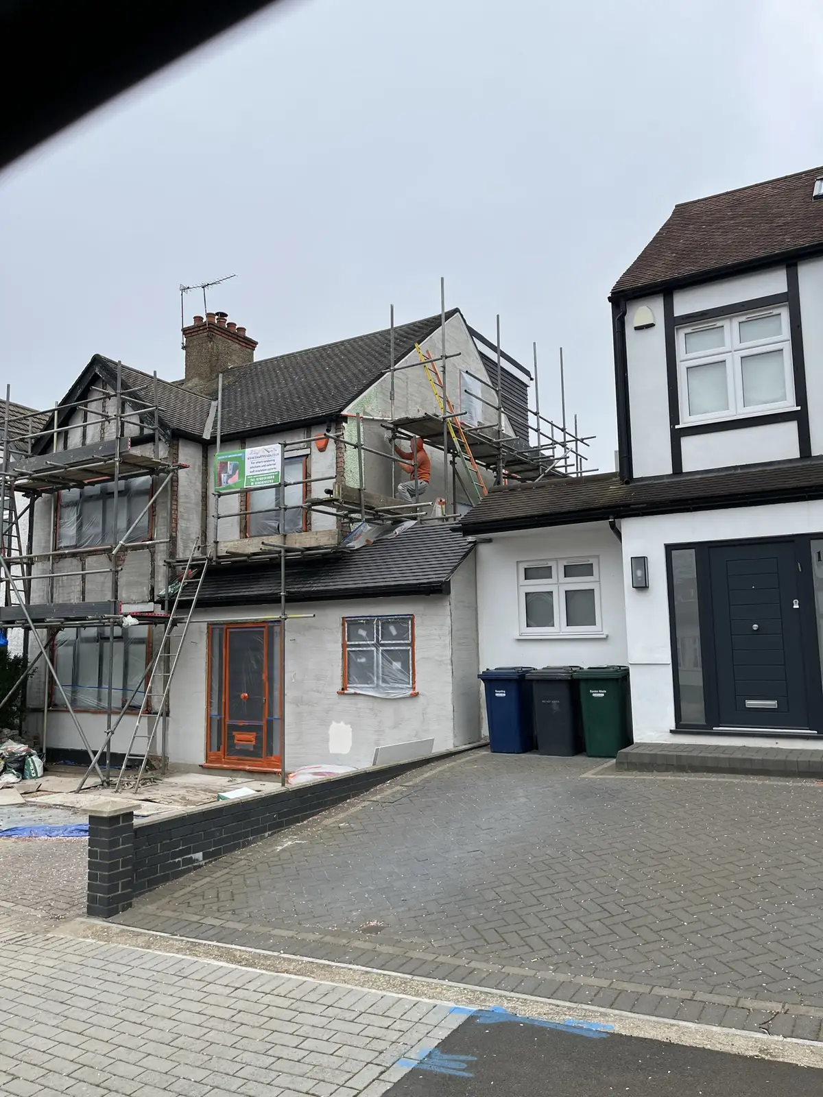Smart Renda site board on scaffolding at a North London rendering job in progress